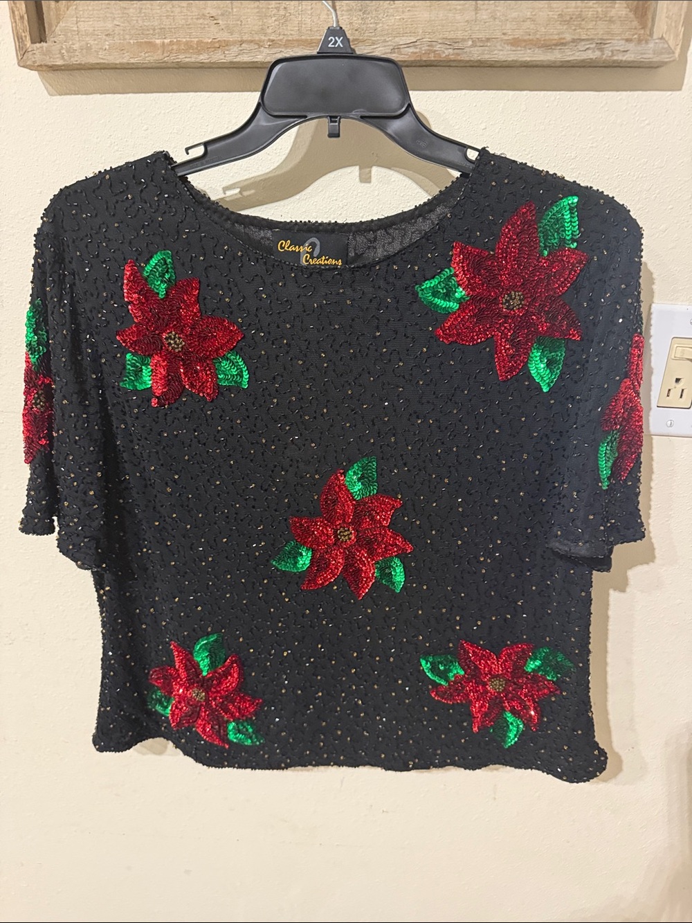 Black Sequin Short-Sleeve Top with Red Poinsettia Motifs
